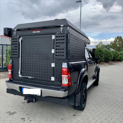 Alu-Cab Canopy Camper Toyota Hilux Revo D/Cab ab 2016+ in schwarz Alu-Cab Canopy Camper Toyota Hilux Revo D/Cab ab 2016+ in schwarz